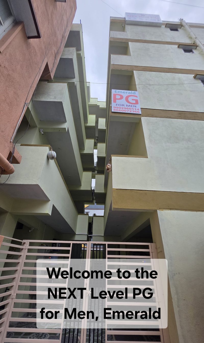 NEXT Level PG for Men, Emerald building entrance and signage